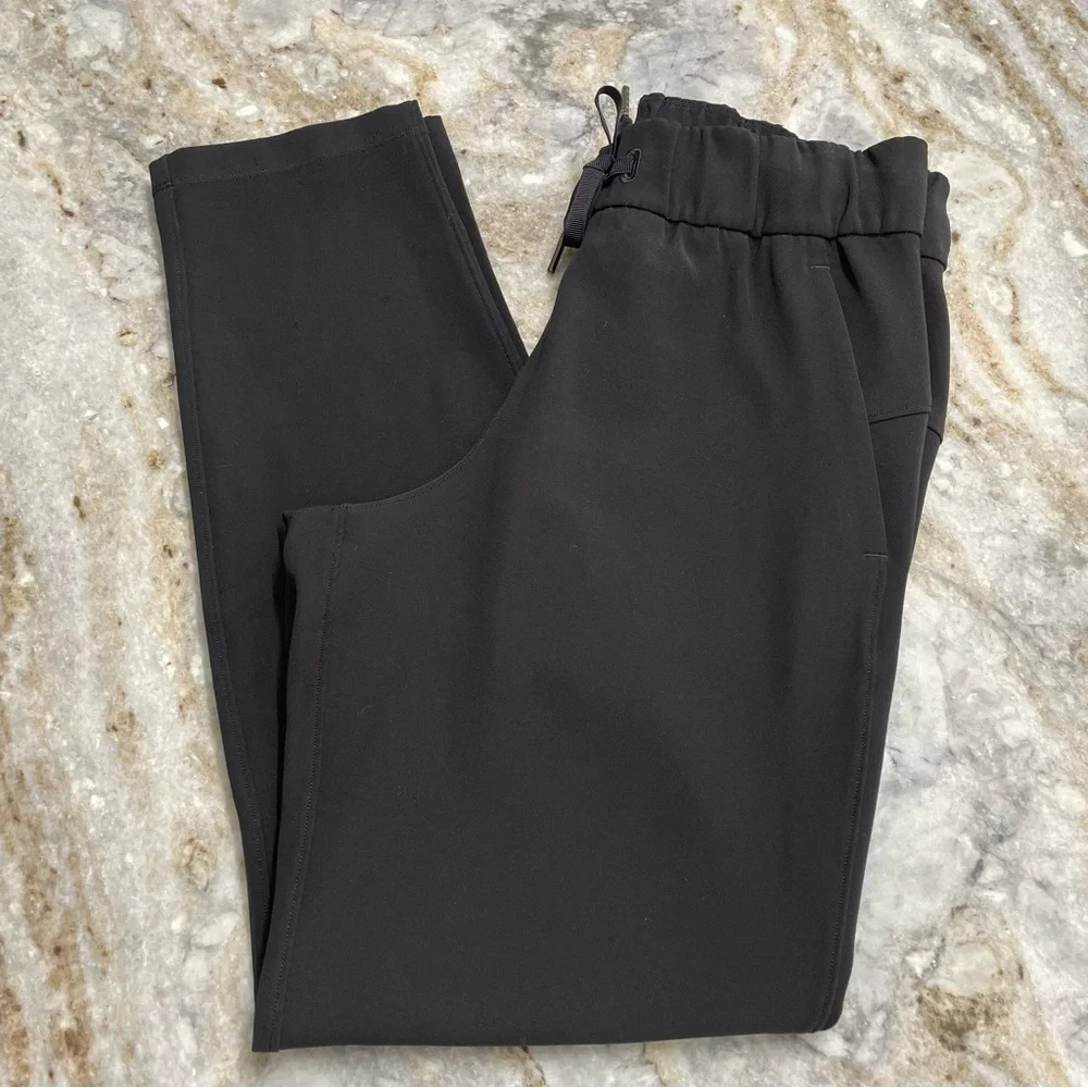 Lululemon On the Fly 7/8 Black Woven Pants Size 4 Office Casual Travel 27"